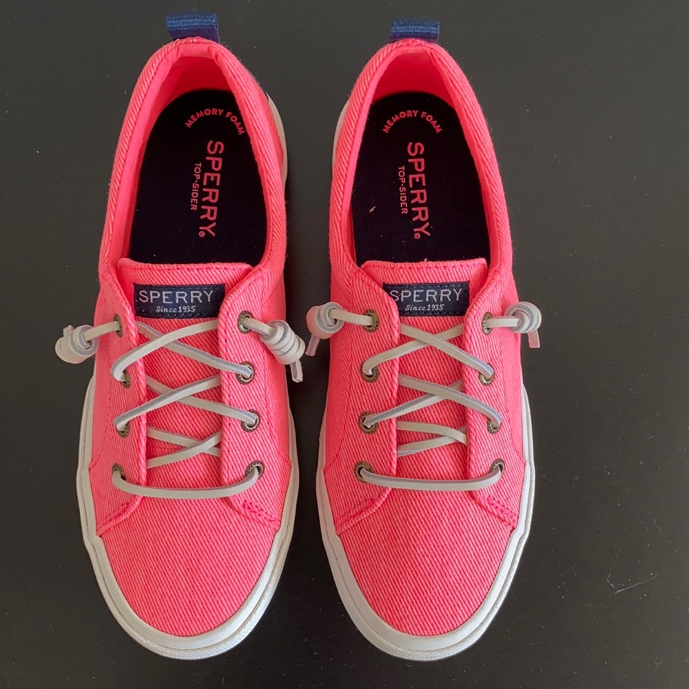 Bright pink Sperry canvas boat shoes